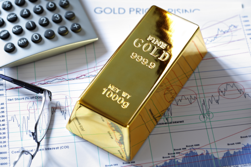 Gold bullion barr on a stocks and shares chart