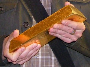 holding-gold-bar