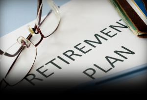 retirement-plan-with-pen-and-glasses