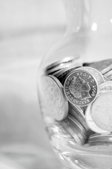 silver coins in a jar