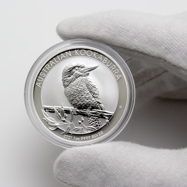 silver and gold coin